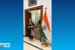 Shivani Raja MP stood with an Indian flag.