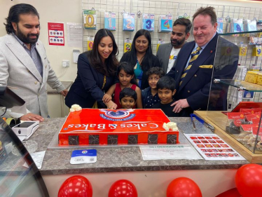 Shivani Raja MP cutting an anniversary cake at Cakes and Bakes